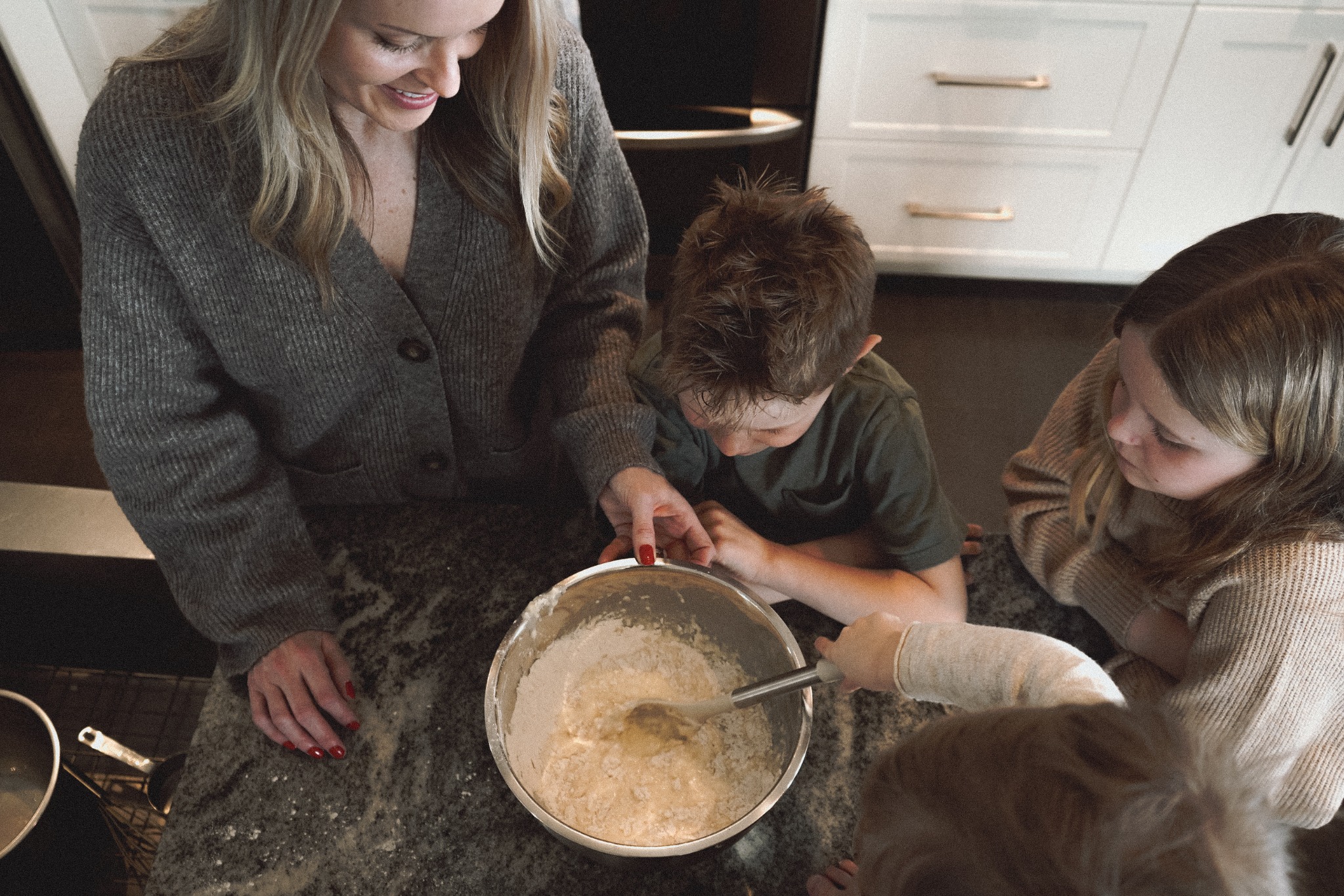 A family baking together in their kitchen